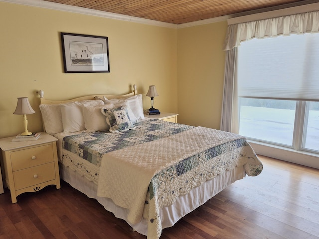 528 W Rd, Belgrade, ME 04917 - bedroom featuring wooden ceiling, ornamental molding, multiple windows, and dark wood-style floors