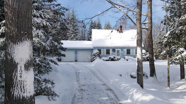 view of front of property featuring a garage