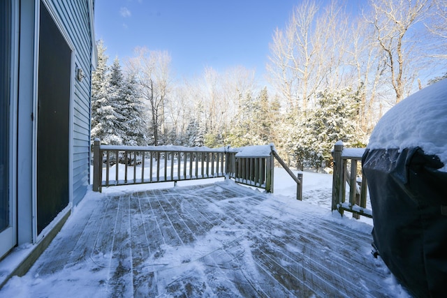 view of snow covered deck