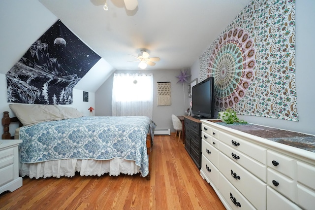 bedroom featuring vaulted ceiling, a baseboard heating unit, ceiling fan, and light hardwood / wood-style floors