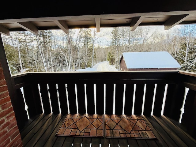view of snow covered deck
