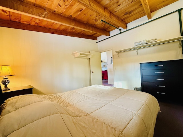 bedroom featuring beamed ceiling and wood ceiling