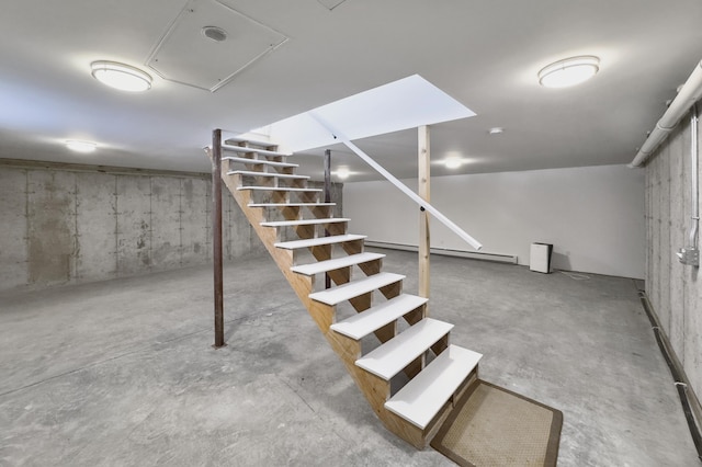 basement featuring baseboard heating
