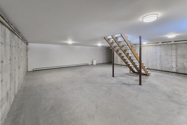 basement featuring a baseboard heating unit