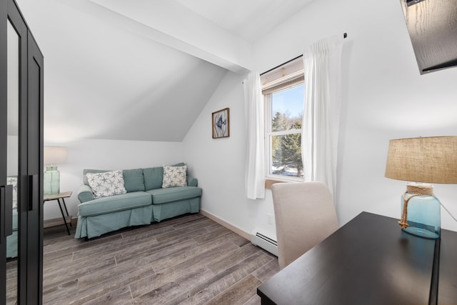 office space featuring lofted ceiling, dark wood-type flooring, and baseboard heating