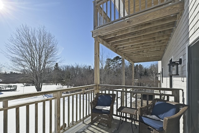 view of snow covered deck
