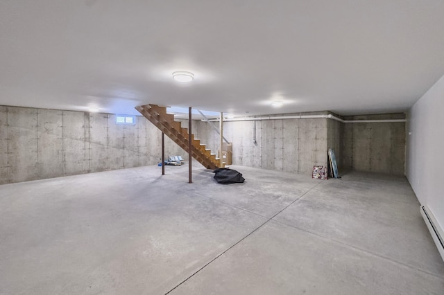 basement featuring a baseboard radiator