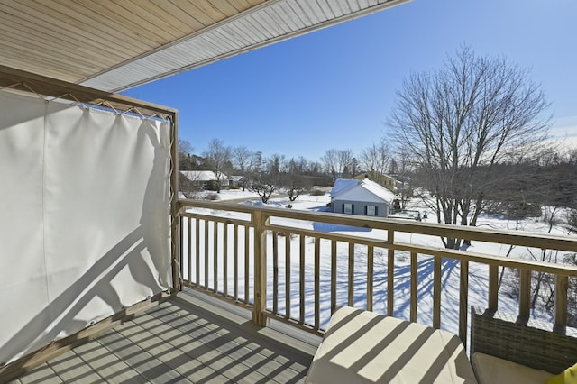 view of snow covered deck