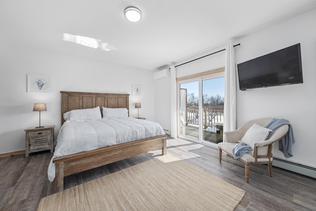 bedroom featuring a wall mounted air conditioner, access to outside, dark hardwood / wood-style floors, and a baseboard heating unit