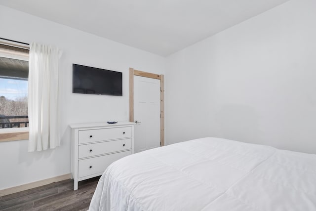 bedroom featuring dark hardwood / wood-style floors