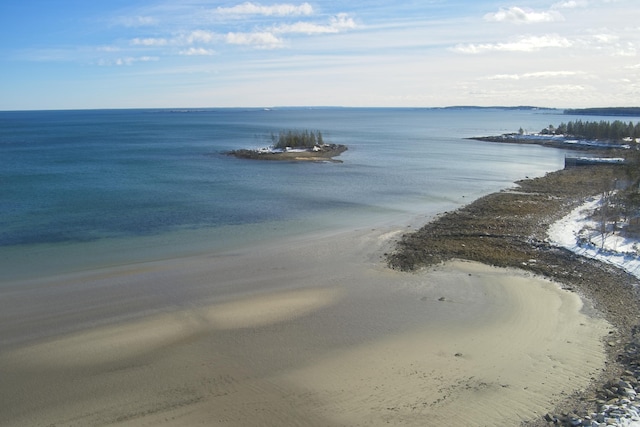 view of water feature with a beach view
