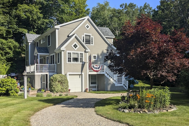 front of property featuring a garage and a front yard