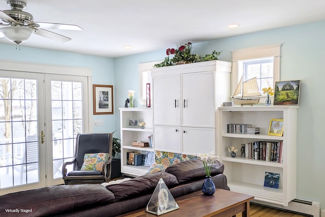 sitting room with ceiling fan