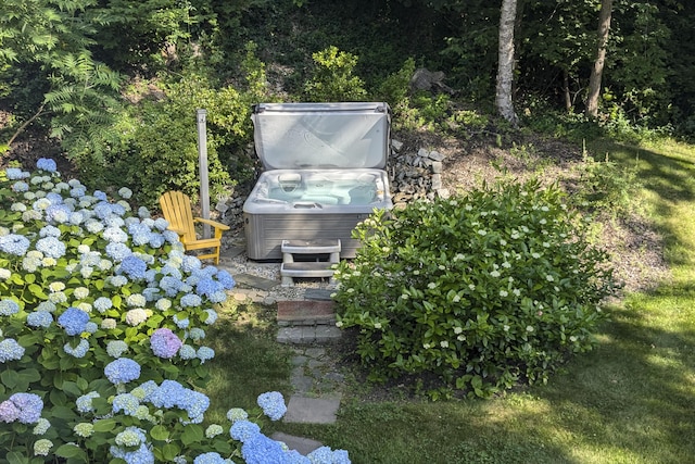 exterior details featuring a hot tub