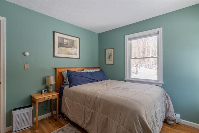 bedroom featuring wood-type flooring