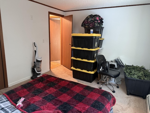 carpeted bedroom with ornamental molding, a textured ceiling, and a baseboard radiator