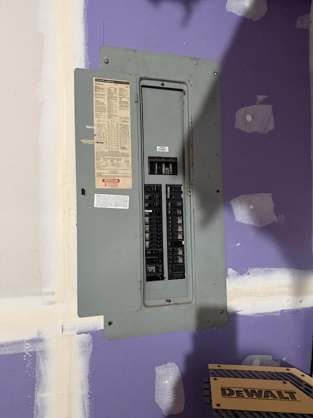 utility room with electric panel