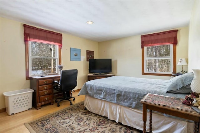 bedroom featuring wood finished floors