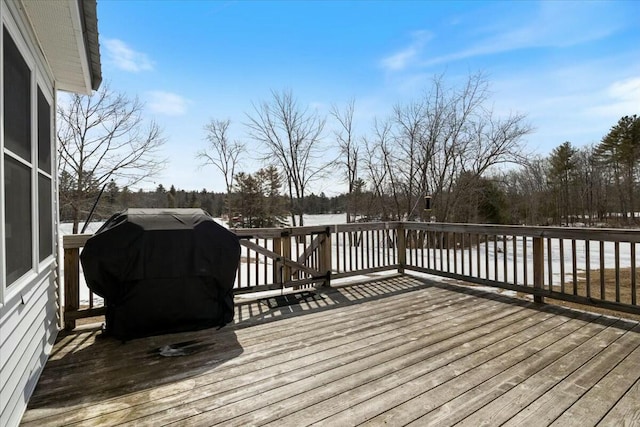 wooden terrace with area for grilling