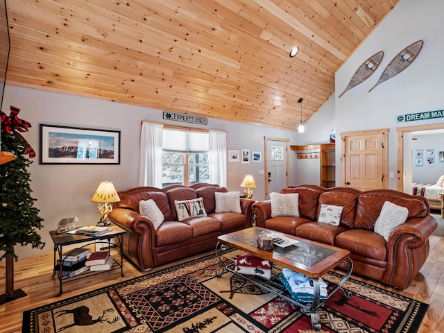 living room with wood ceiling, high vaulted ceiling, and light hardwood / wood-style floors