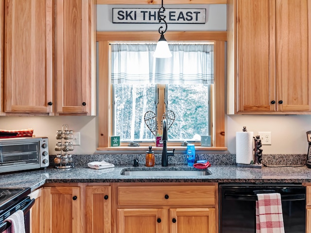 kitchen with dark stone counters, black dishwasher, and sink