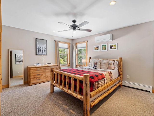 carpeted bedroom with a wall mounted air conditioner, ceiling fan, and baseboard heating