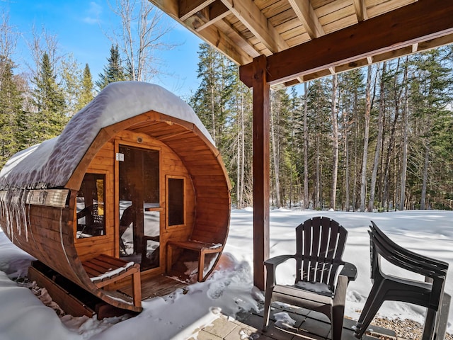 view of snow covered patio