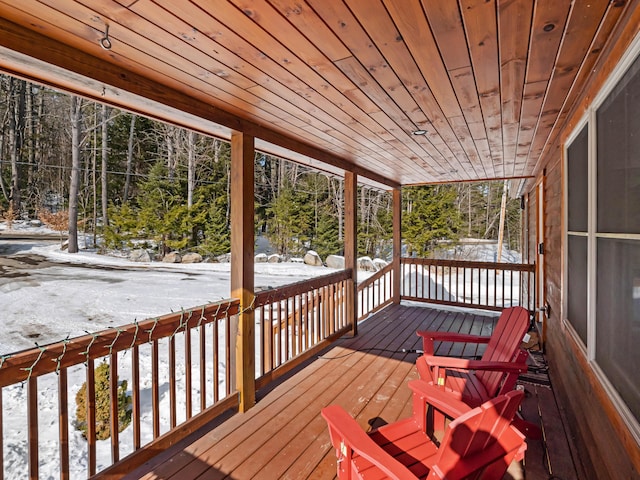 view of snow covered deck