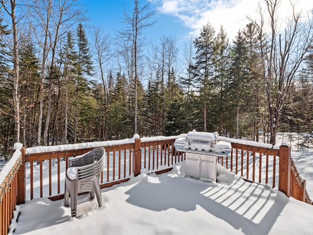 view of snow covered deck