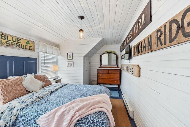 bedroom with lofted ceiling, wooden ceiling, and baseboard heating