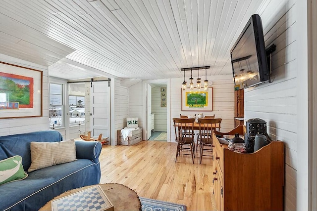 sunroom / solarium featuring wood ceiling