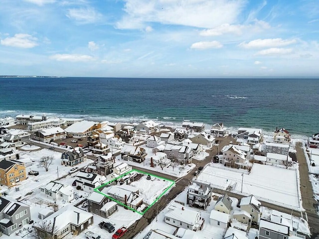 bird's eye view featuring a residential view and a water view