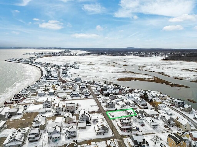 aerial view featuring a water view, a residential view, and a view of the beach