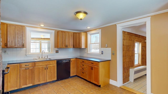 kitchen featuring a sink, plenty of natural light, black dishwasher, and radiator heating unit