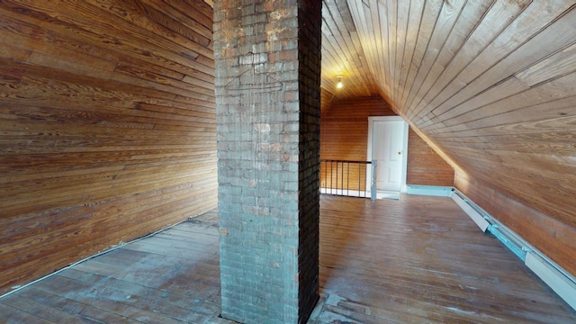 interior space with wood walls, wood ceiling, lofted ceiling, and wood-type flooring