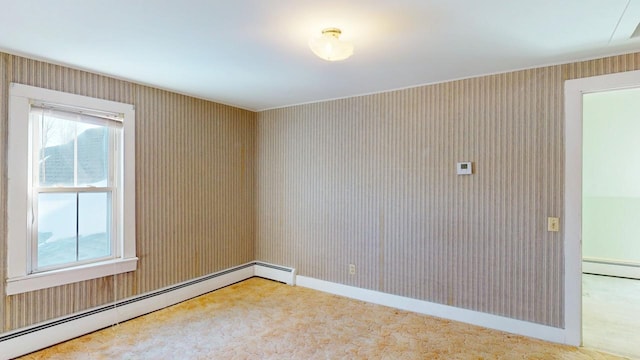 carpeted empty room with plenty of natural light and baseboard heating