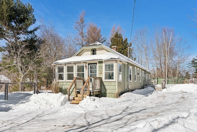 view of front of home with fence