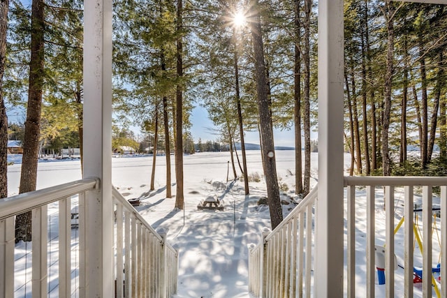 view of snow covered deck