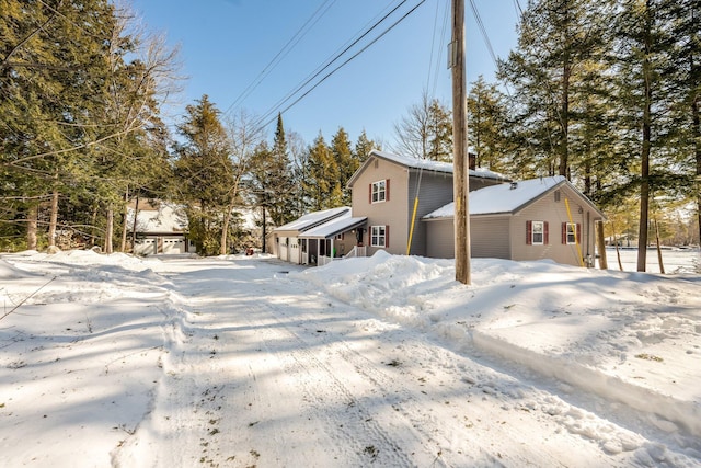 view of snow covered property