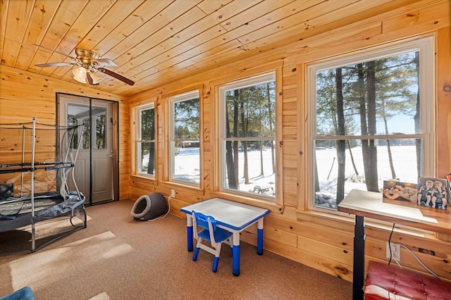 sunroom / solarium with wood ceiling