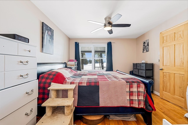 bedroom featuring ceiling fan and wood finished floors