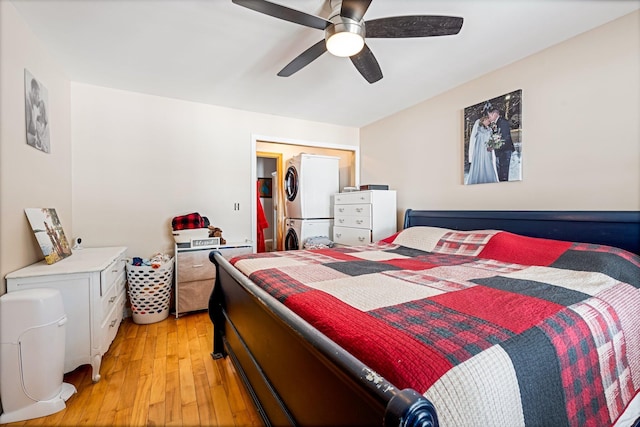 bedroom featuring light wood-style flooring and a ceiling fan