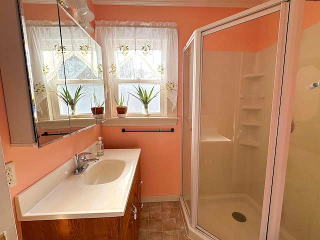 bathroom featuring walk in shower and vanity