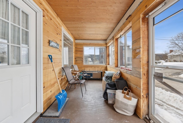 sunroom / solarium featuring wood ceiling