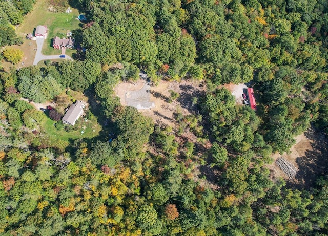 aerial view featuring a view of trees