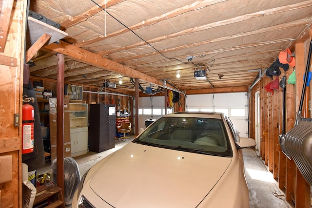 garage featuring a garage door opener