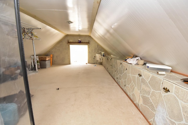 bonus room featuring lofted ceiling