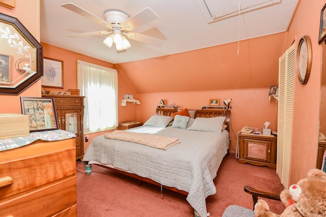 bedroom featuring vaulted ceiling, carpet flooring, and ceiling fan