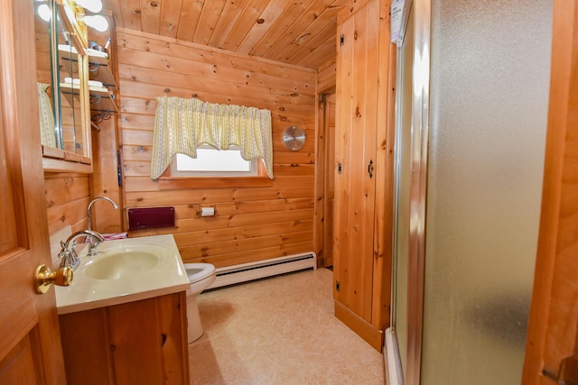 bathroom featuring an enclosed shower, a baseboard radiator, vanity, and wood walls