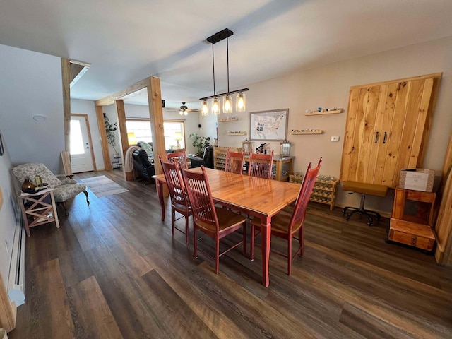 dining room featuring ceiling fan and dark hardwood / wood-style flooring